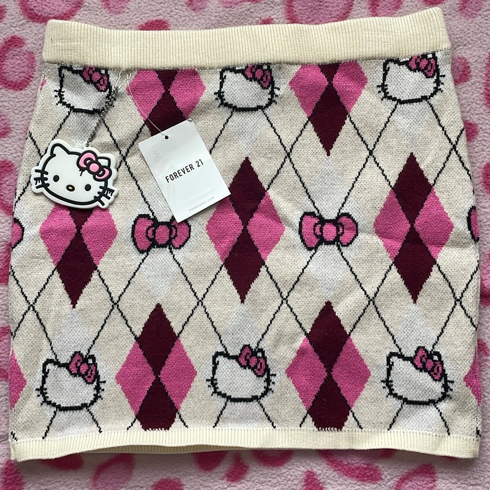 Hello Kitty pencil skirt with the keychain never been worn the tag still on
